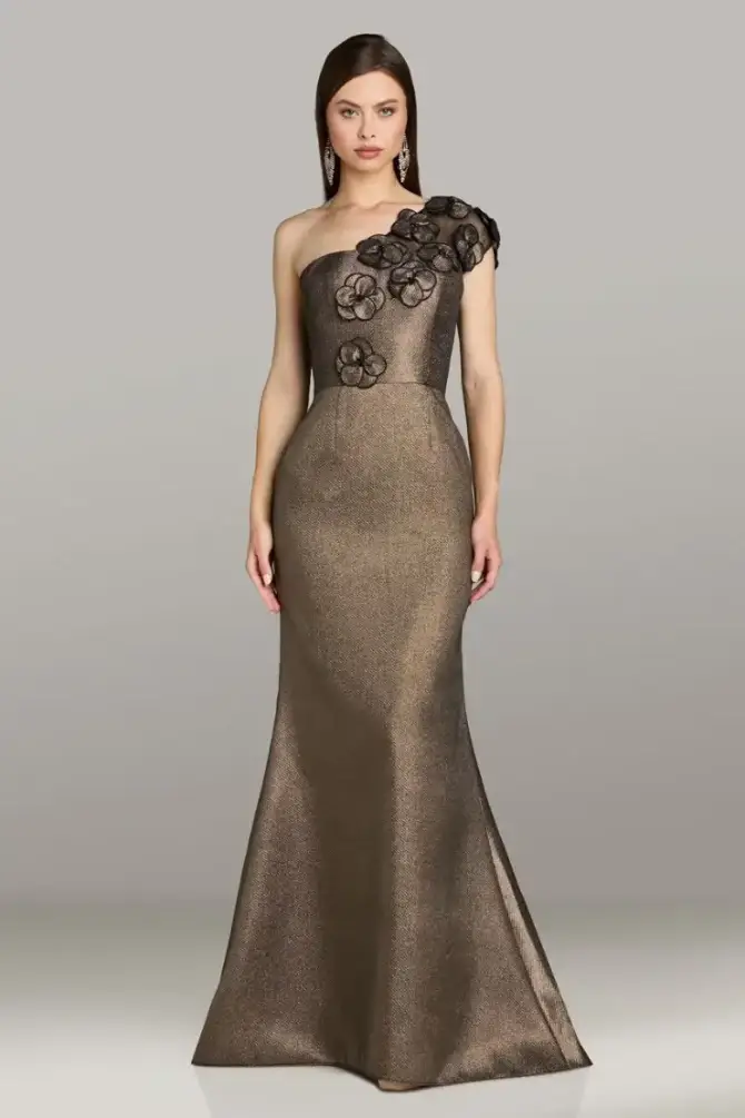 model is wearing a one shoulder brown fit and flare mother of the bride dress