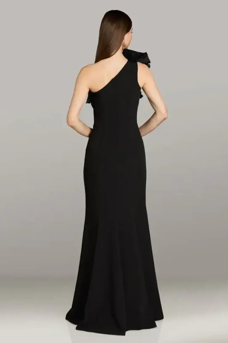model is wearing a black sheath one shoulder mother of the bride gown