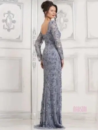 model is wearing a long sleeve lace mothers dress